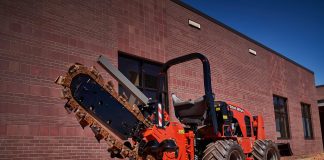 Ditch Witch's new RT70 with its blade raised.