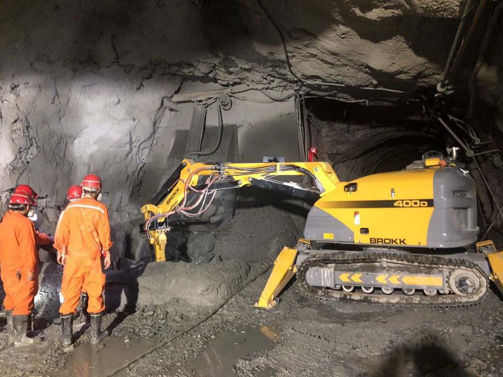 One of Brokk's remote-controlled demolition robot mining underground.