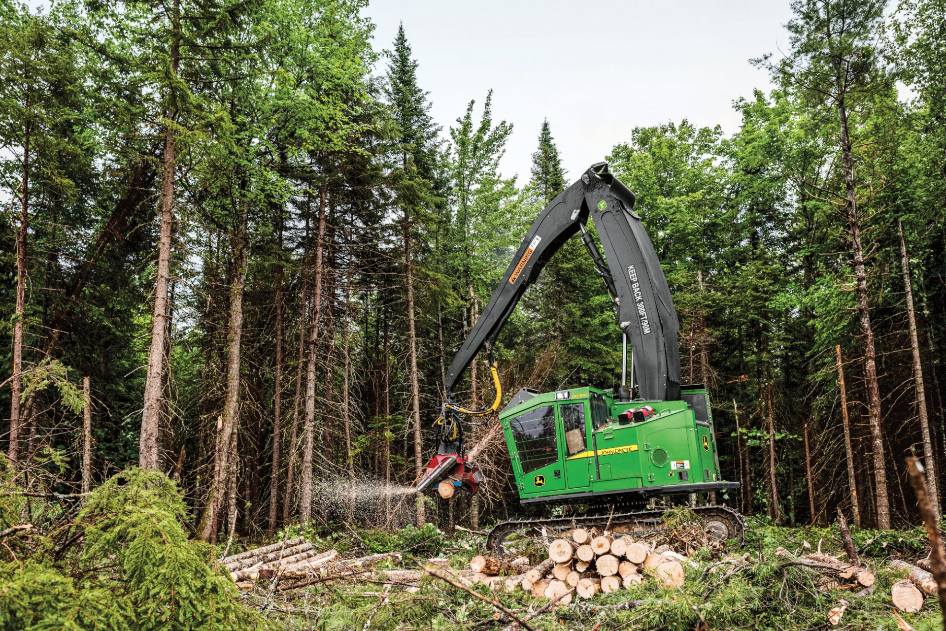 New updated John Deere M-Series forestry equipment on-the-job.