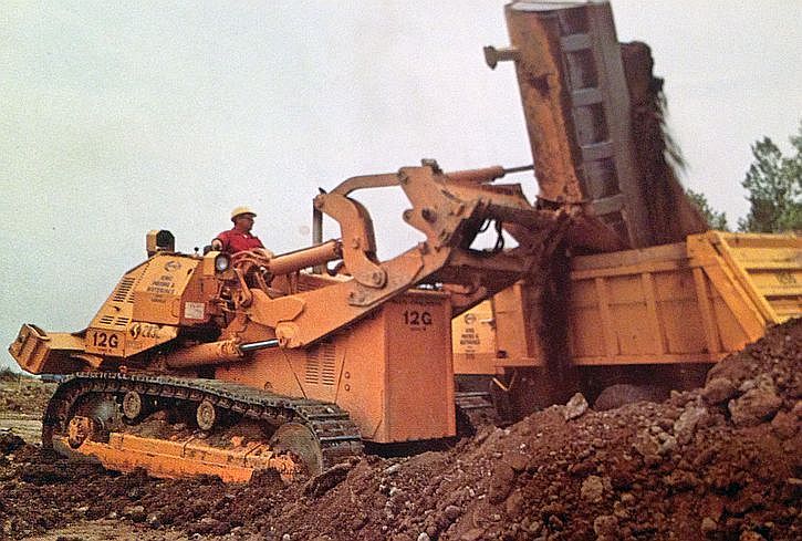 1960s Allis-Chalmers 12G Series B crawler loader with side-dump bucket on site in Oakville