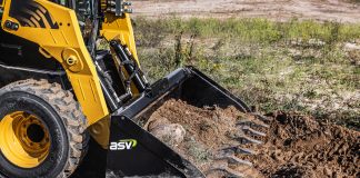 An ASV skid steer with a bucket attachment from the company's new line of attachments.