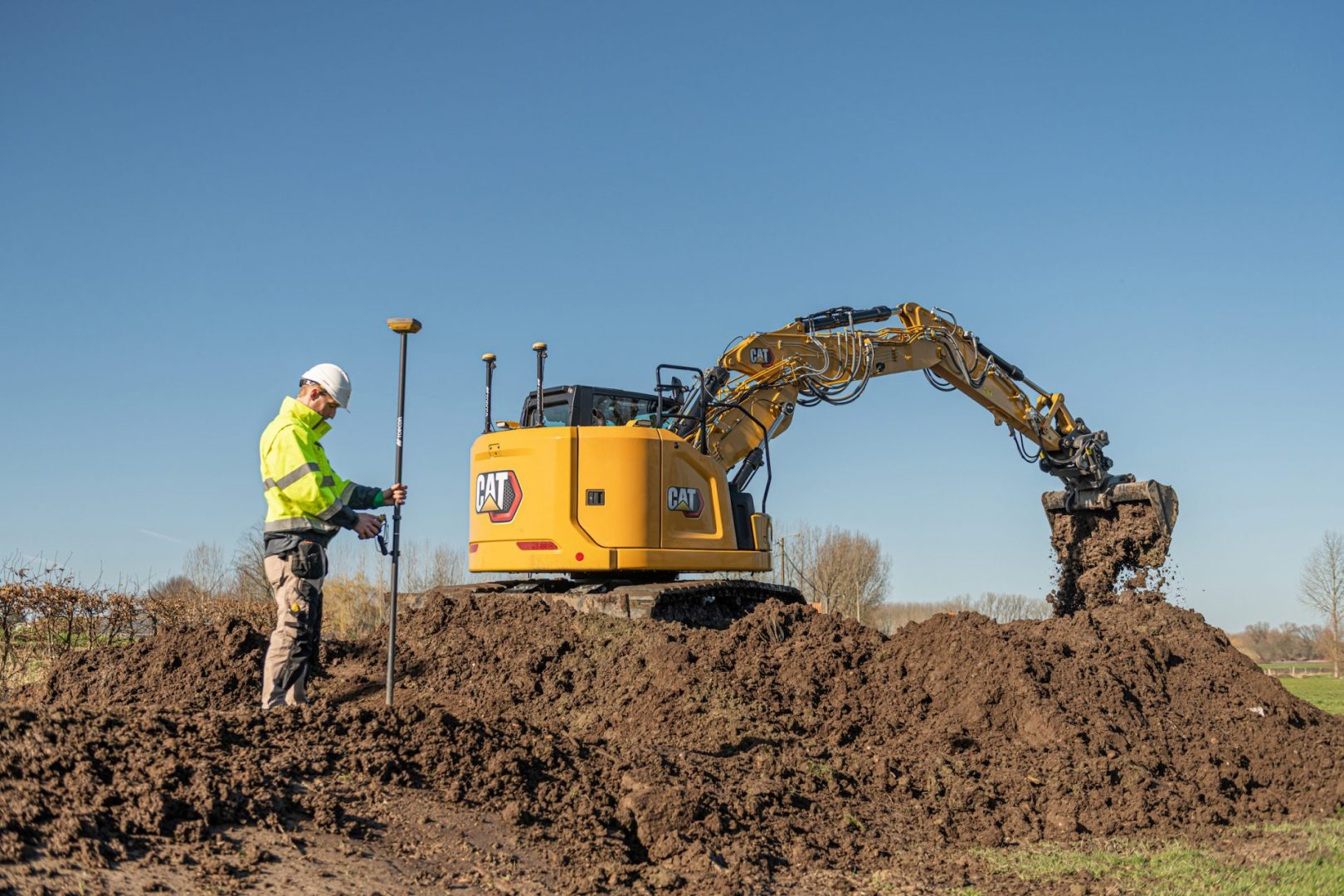 a caterpillar excavator equipped with Topcon