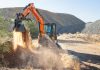 The Develon DX42-7 mini excavator moves dirt