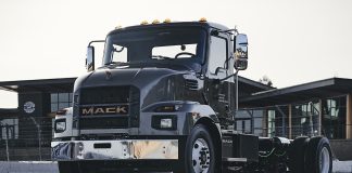 A Mack truck parked in a lot