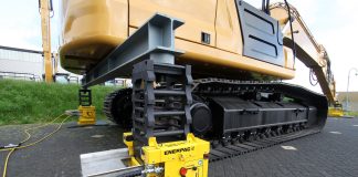 The Enerpac lifting system lifts an excavator