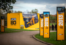 A 1:1 scale backhoe celebrates JCB’s 80th birthday A life sized JCB 3CX Sitemaster is packaged in Britains toy packaging at JCB World Headquarters in Staffordshire, to celebrate the company and Chairman Lord Bamford's 80th Birthday.